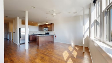 Kitchen with a kitchen breakfast bar, open floor p