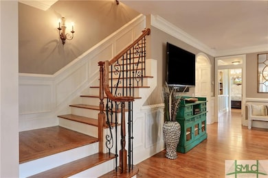 Beautiful Staircase as you enter home