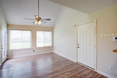 Large living room with an open balcony.