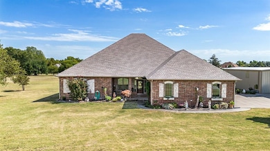 View of front of home featuring a front yard