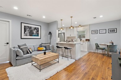 Living room featuring light wood-type flooring, r