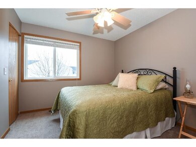 2nd upper bedroom with also features a walk-in clo