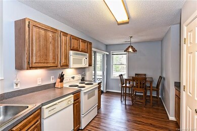 Dining area with sliders to screen porch and deck.