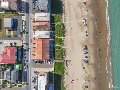 Aerial view of waterfront with a beach