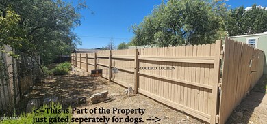 Additional Yard outside Wooden Fence