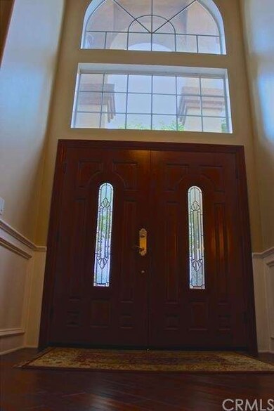 Beautiful front double entry doors with leaded gla