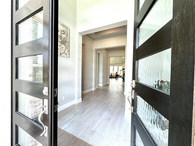 Step into elegance with a grand entryway featuring