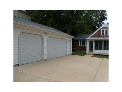 Exterior Back. with 792 Sq Ft 3 Car Garage and new