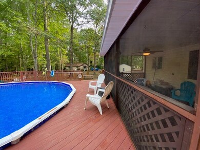 View from deck to screened in porch