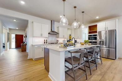 Photo of a decorated model. Features will vary.