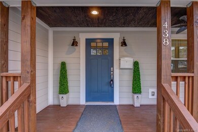 Natural wood trim and a fresh color scheme make th