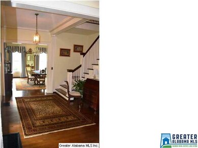 Gracious foyer with stairs winding up