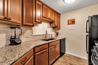 Kitchen has granite countertops and was updated in