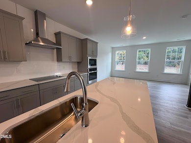 5956 Dunzo Dr, Raleigh, NC 27617 - photo 4