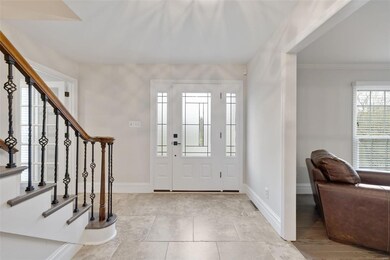Entry Way. New Front Door, Ceramic Tile. Glass Door leading to main floor office.
