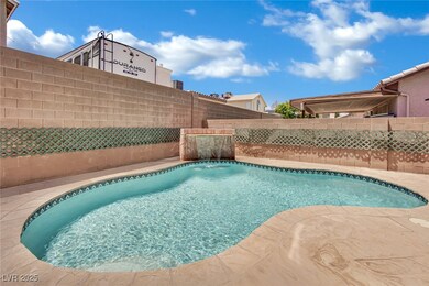 View of pool with a fenced backyard