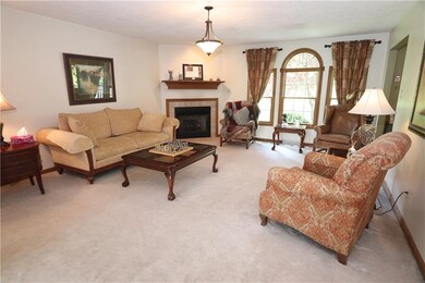 Bright living room straight through the foyer warm