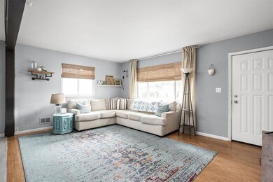 Living Room with views to Riverwood Park!