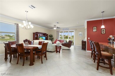 Dining area with visible vents, baseboards, orname