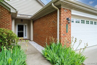 Entrance to property featuring a garage