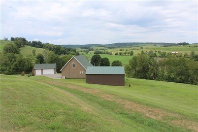 Hilltop views of of rolling pastures and hayfields