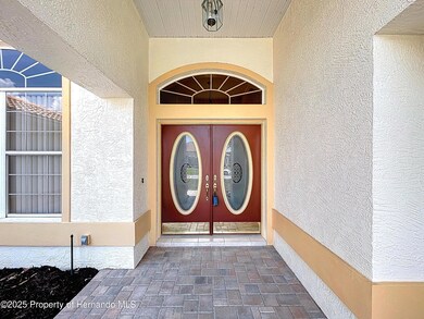 Double entry w/ transom window