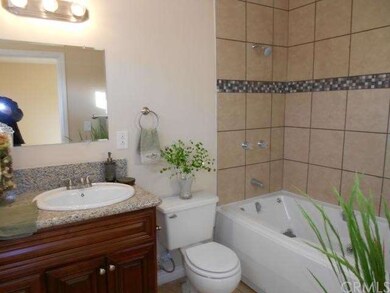 Master bath has whirlpool tub.