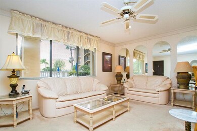 Living room with a pool view