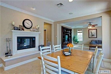 Casual eating area with fireplace.