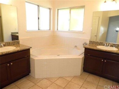 Master bathroom with soaking tub! Easy care tile f