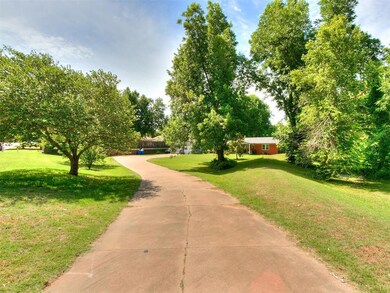 View of home's community featuring a yard