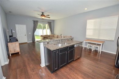 Open concept kitchen with granite countertops