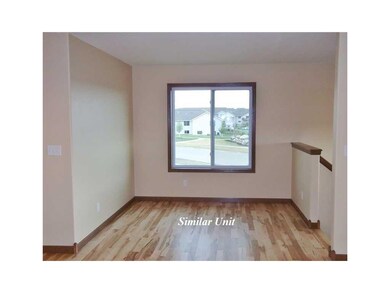 Dining Area. Picture is of Similar Unit.