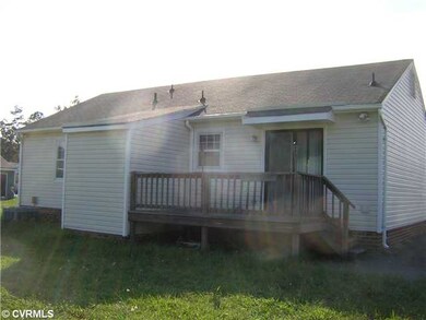 Other - Deck overlooks large backyard.  Sliding gl