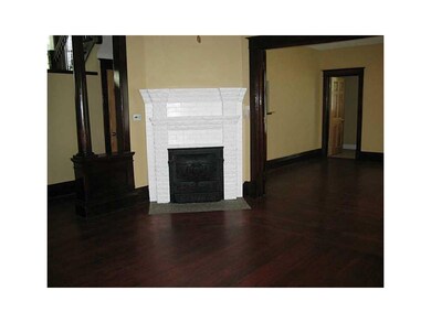 Living Room. Beautiful fireplace with so much deta