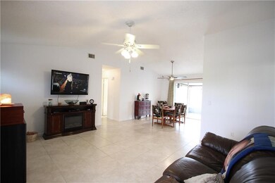 Spacious Dining Area with Sliding Doors out to Scr