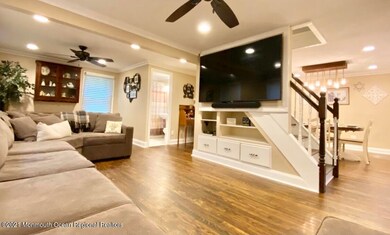 Built in under steps on Living Room side