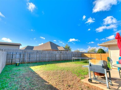View of yard with a trampoline