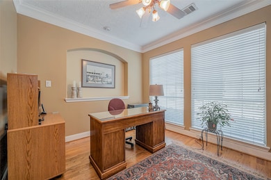 Home office conveniently located to the right of t