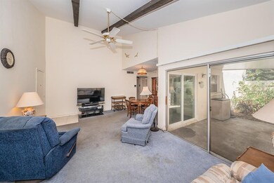 Living room with patio views