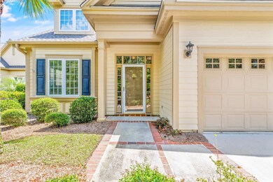 Entrance to property with a garage