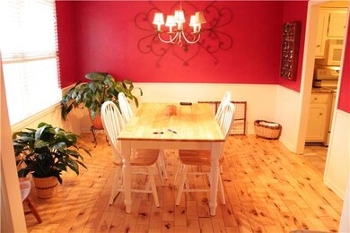 DINING ROOM OFF KITCHEN WITH BEAUTIFUL HARDWOOD FLOORS