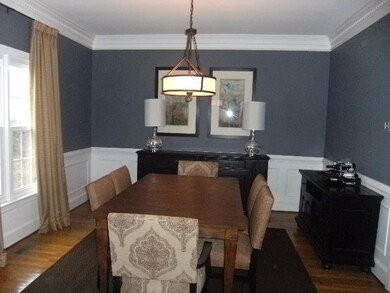 FORMAL DINING ROOM with wood floors and extensive 