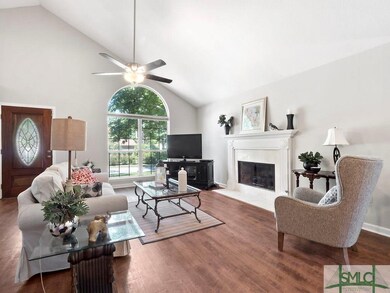 Great Room with beautiful arched window illuminate