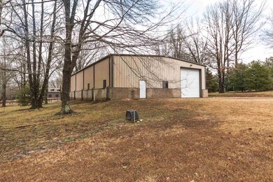 Large 50'x80' shop features two garage doors. One 