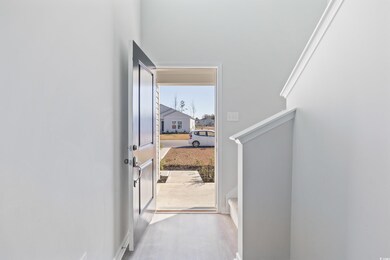 Doorway featuring a healthy amount of sunlight and