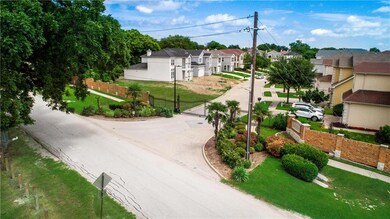 Gated entrance to a private community with code ac