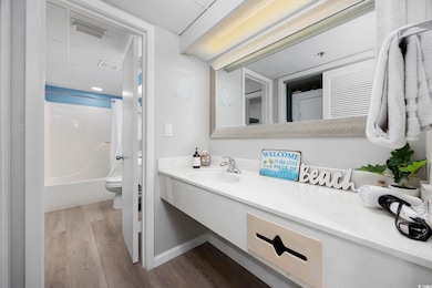 Full bathroom with shower / tub combo with curtain
