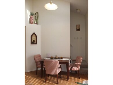 Dinette with vaulted ceilings and a skylight.