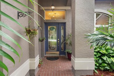 This home has nice curb appeal with lush landscapi